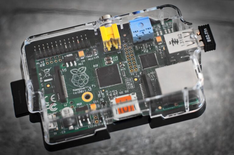 green circuit board with clear glass case